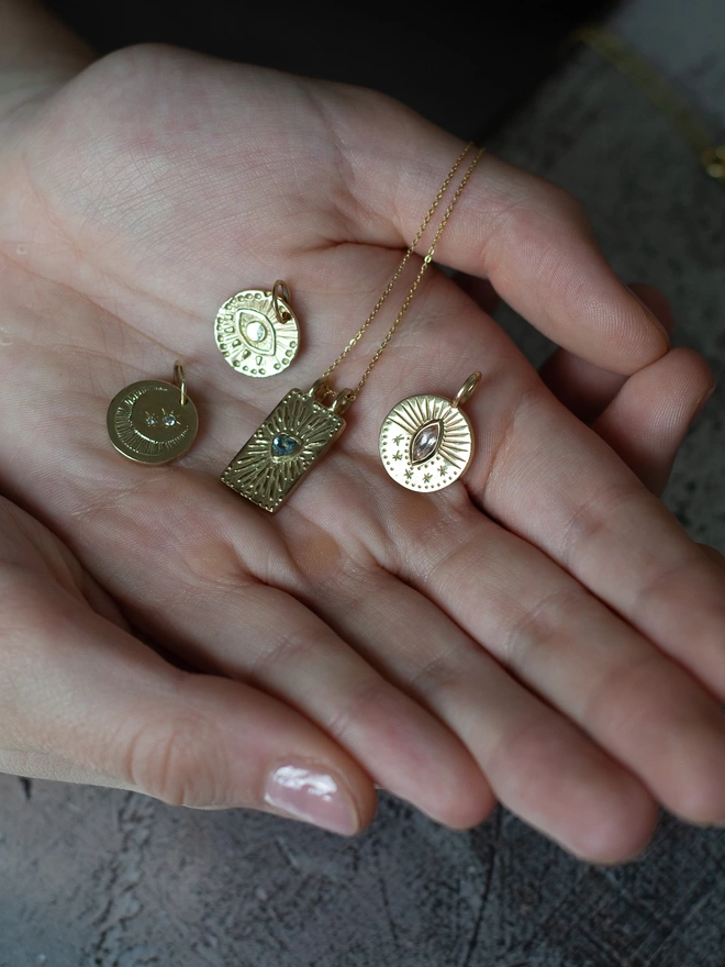 talisman gold necklaces