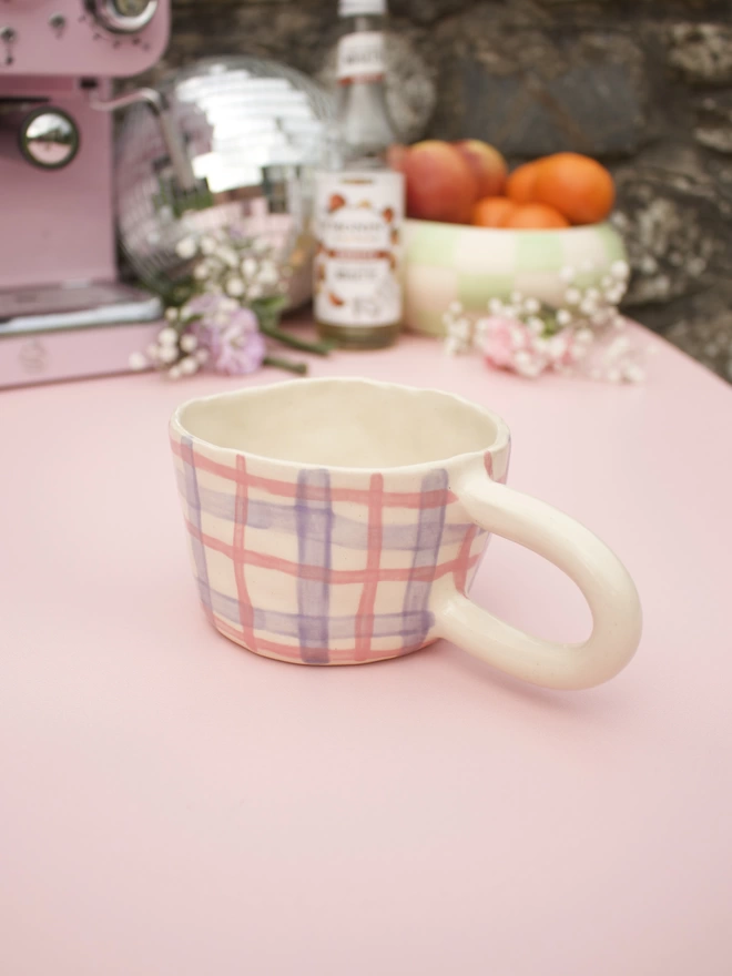 pink and purple gingham striped patterned stoneware pottery mug 