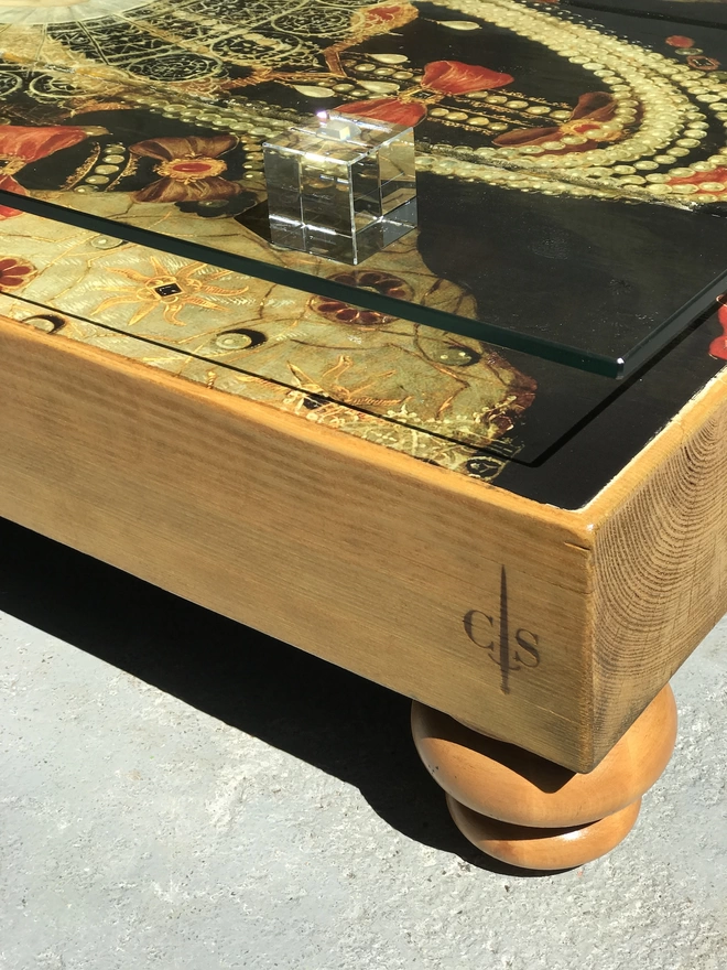 natural finish coffee table with glass top