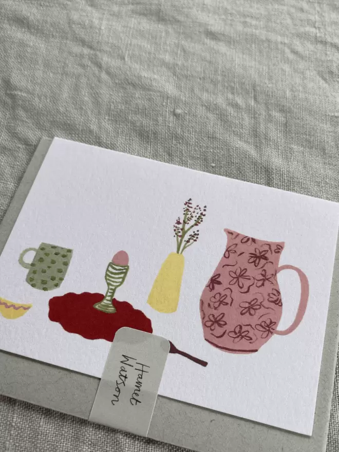 greetings card with jug, mug and a breakfast set up.