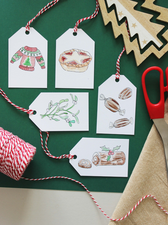 Designs of ‘An Eco-Friendly Christmas' Gift Tag 5 Pack being displayed