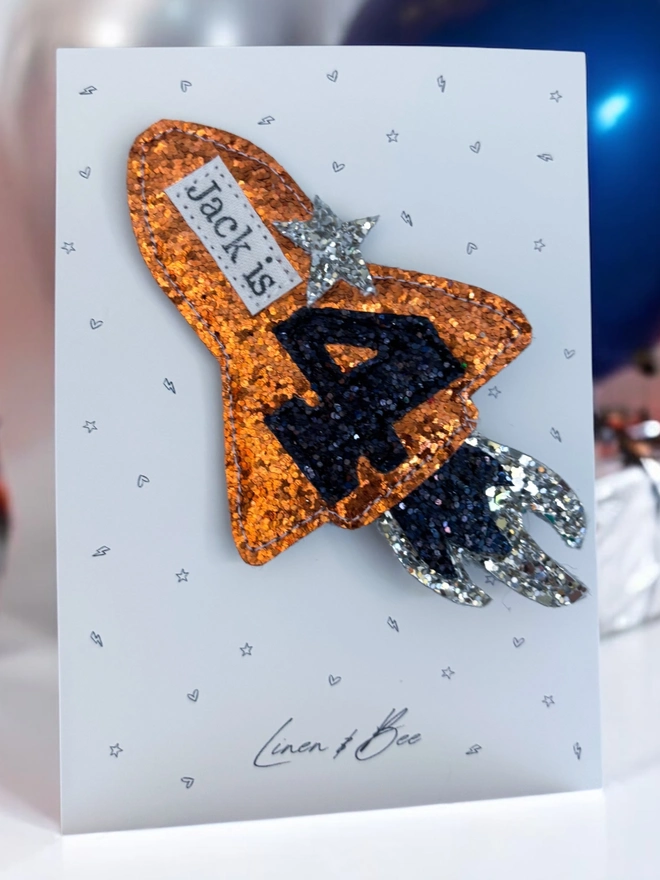 Personalised glitter rocket birthday badge