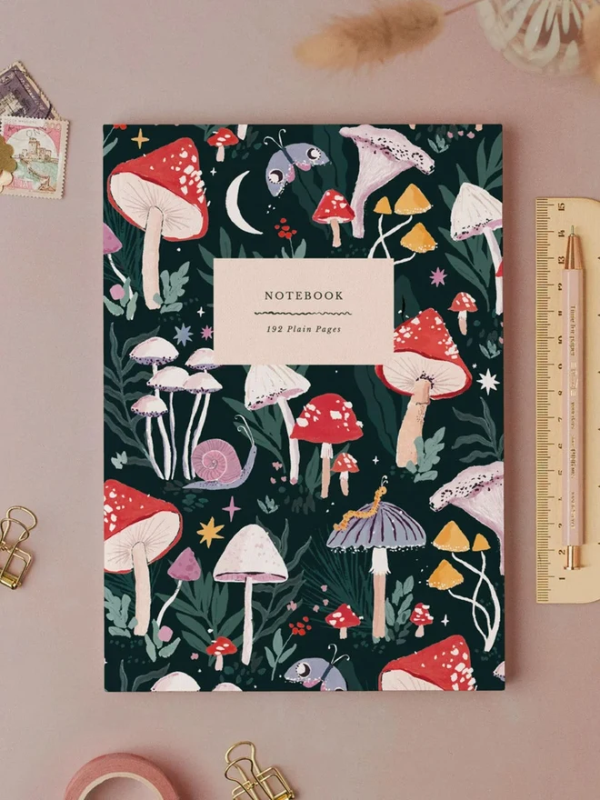 Mushrooms Notebook by Sister Paper Co with a hand-painted toadstool and mushroom cover