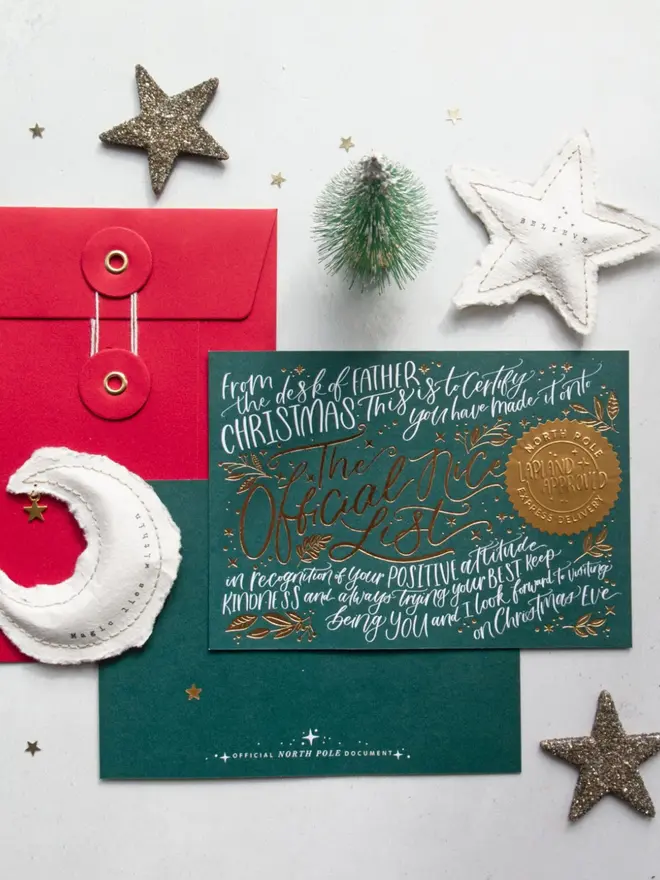 A green certificate praising a positive attitude and kindness, with an embossed gold "Lapland Approved" seal.