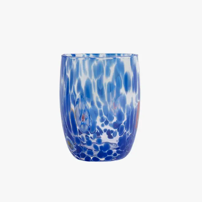 round tumbler glass with blue splotches