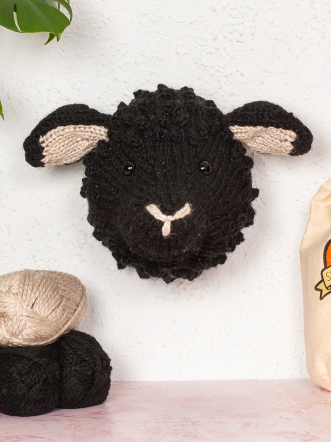 Sheep Head Knitting Kit. A giant black sheep head.