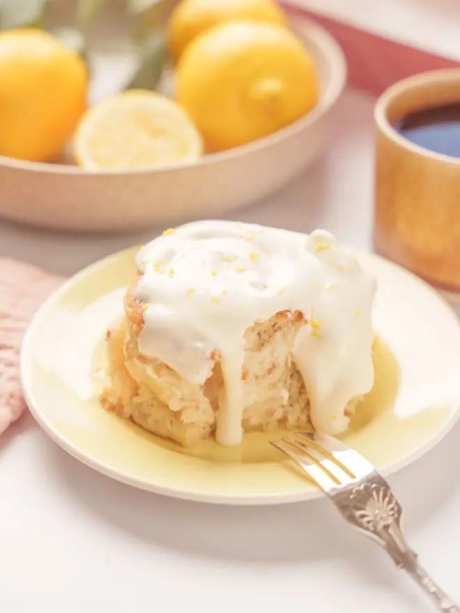 Lemon Drizzle bun with fork on a plate