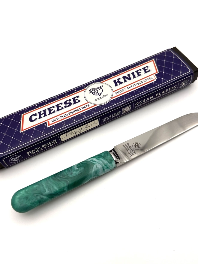 Eco cheese knife crafted from traceable recycled ocean plastic, supporting cleaner seas with every purchase.