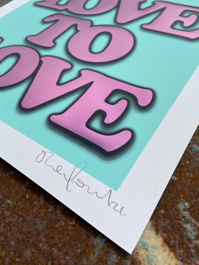 Metallic Hot Foil  "Love to Love" Screen Print in blue. typography says love to love with a drop shadow the print is square 