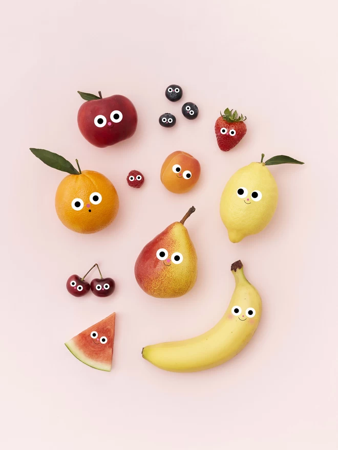 A gang of friendly fruits on a pink background