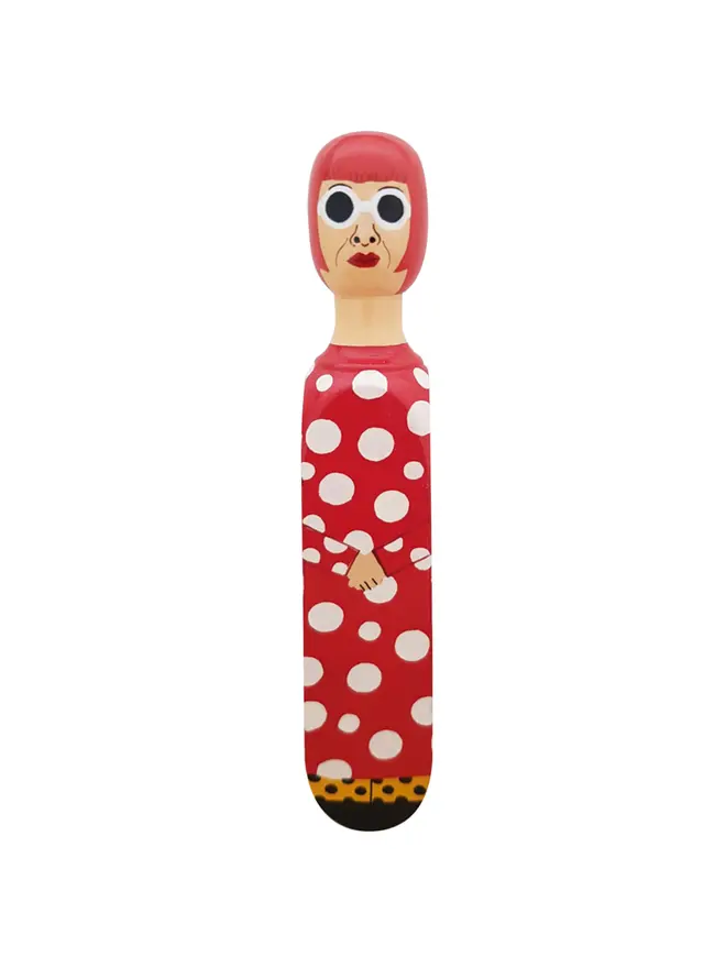 Wooden Door Stopper (Yayoy Red Polka Outfit), a colourful wooden door stop sitting on a plain white surface. 