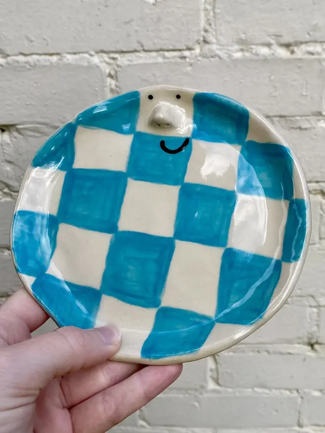 blue white check handmade ceramic smiley face side plate