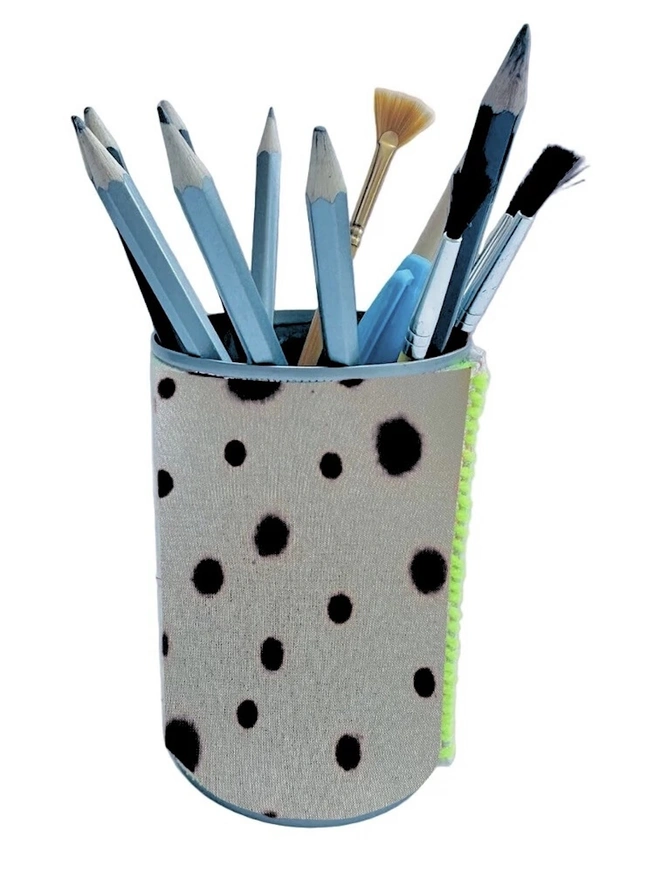 Upcycled & Repurposed Linen Tin Holder Polka Dot Print, a colourful polka dot tin on a white surface with pens and brushes in it. 