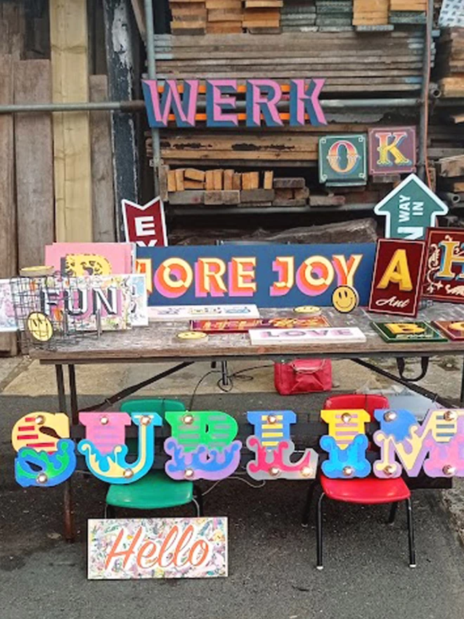 More Joy sign stall