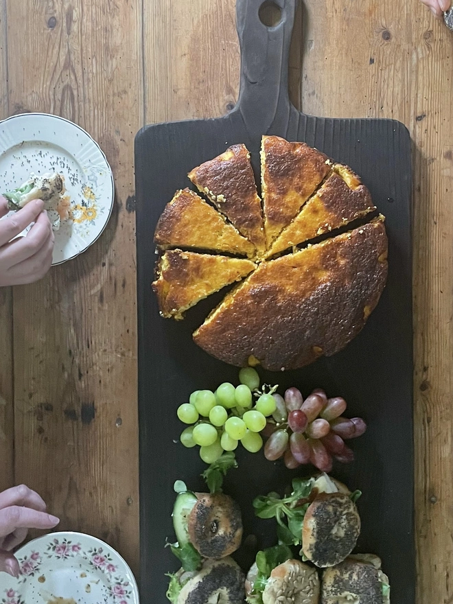Charred yakisugi long serving board with cake and grapes 