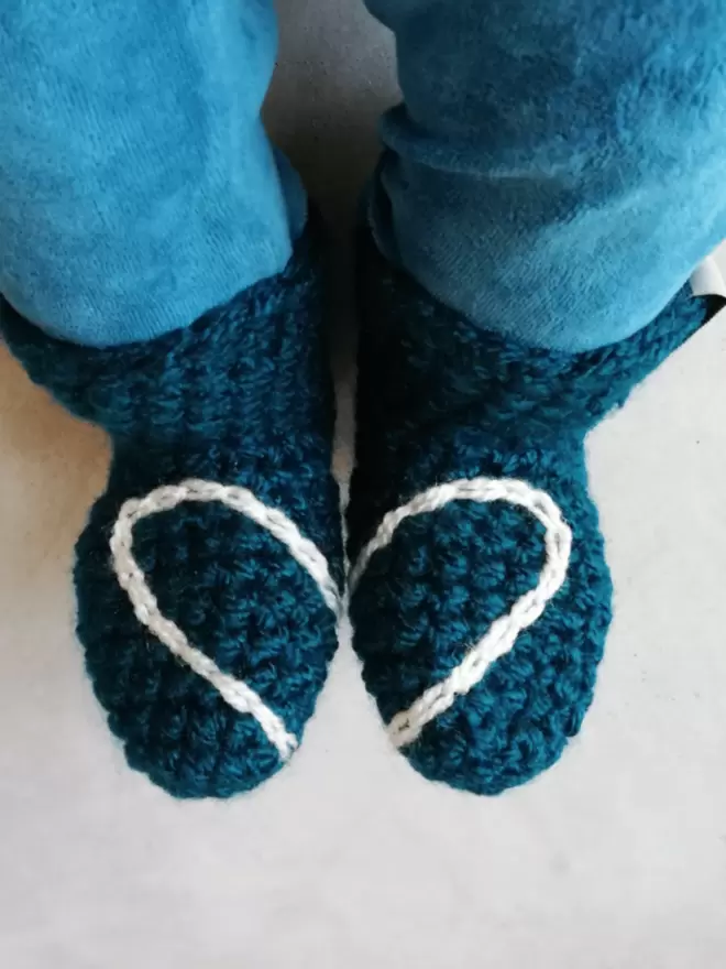 Baby booties with heart embroidery