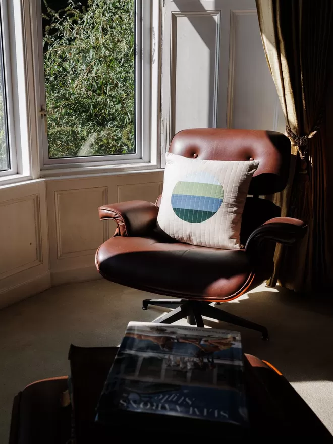 Haze Quilt Cushion On Leather Chair In Living Room