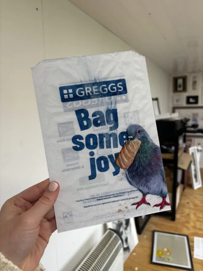 He’s On A Roll Gregs Print, in a room. 