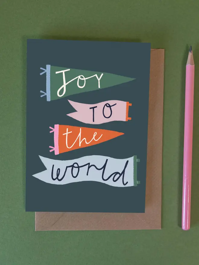 'Joy To The World' Christmas Card', against a green background. 