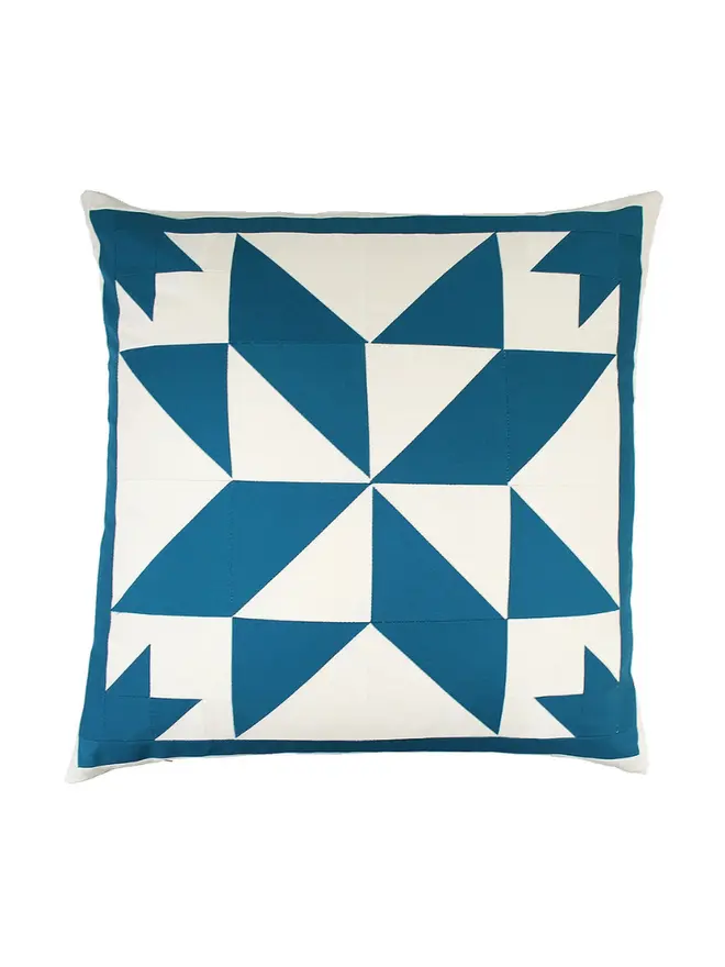Celest Patchwork Cushion, against a white background. 