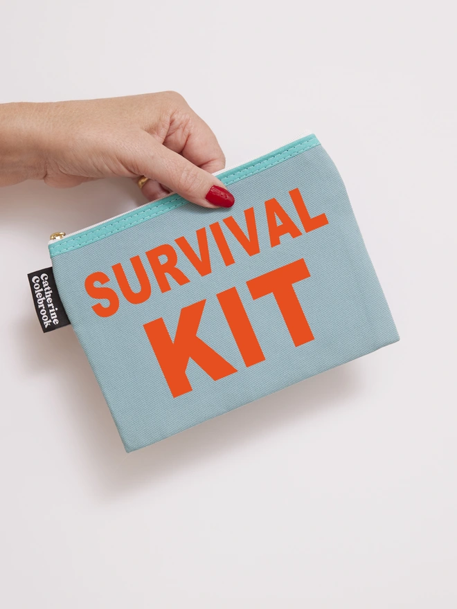 CATHERINE COLEBROOK SURVIVAL KIT POUCH TURQ:ORANGE