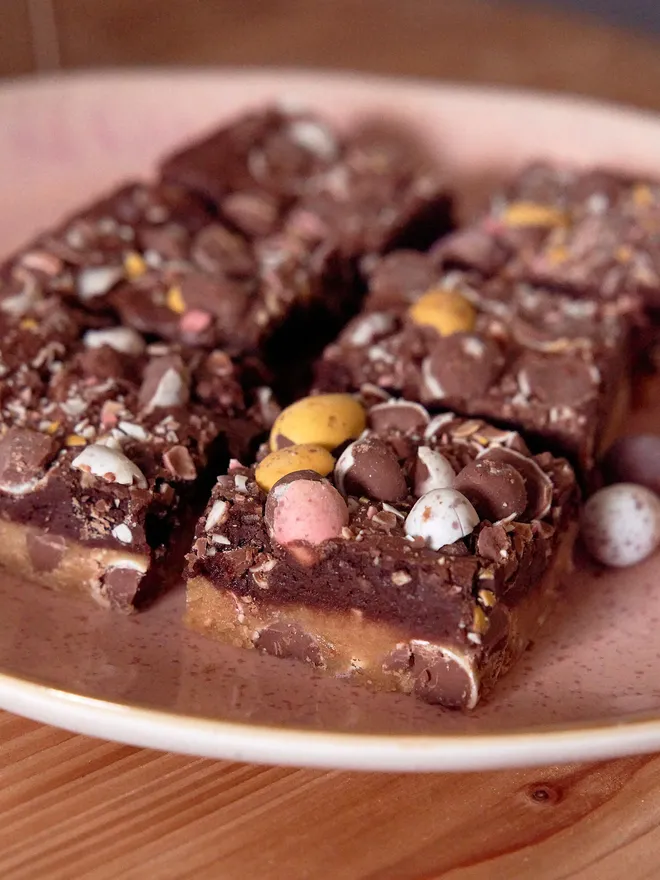 Easter brownies with a cookie base and mini eggs