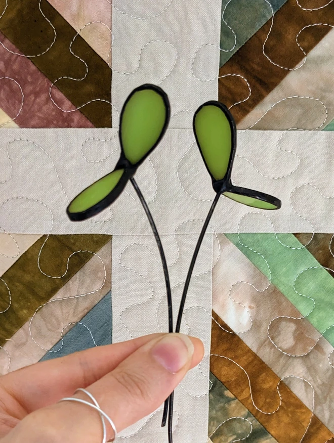 Pair of stained glass seedlings