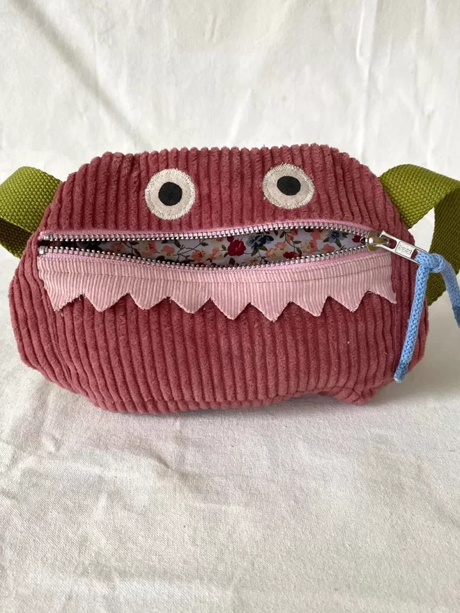 childrens pouch bum bag monster design in pink corduroy