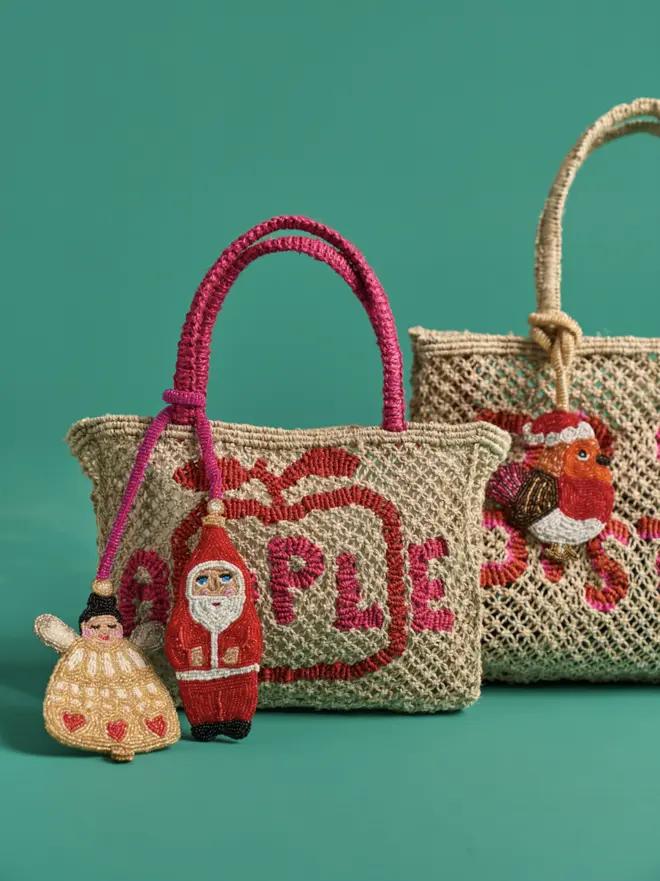 Santa and angel beaded bag charm wrapped around a jute bag from The Jacksons