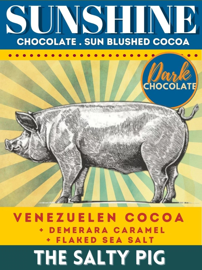 the salty pig salted caramel dark chocolate bar. packaging for a chocolate bar featuring an illustrated pig on a vibrant circus style background.