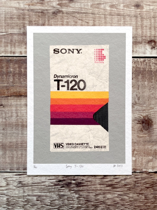 Sony VHS tape print on a wood background