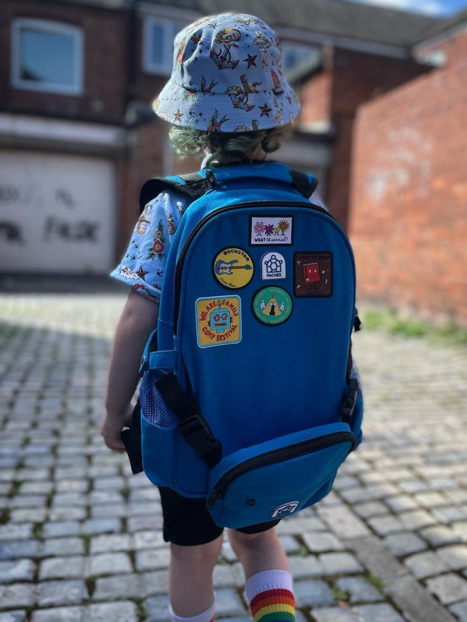 I love to read patch on a backpack