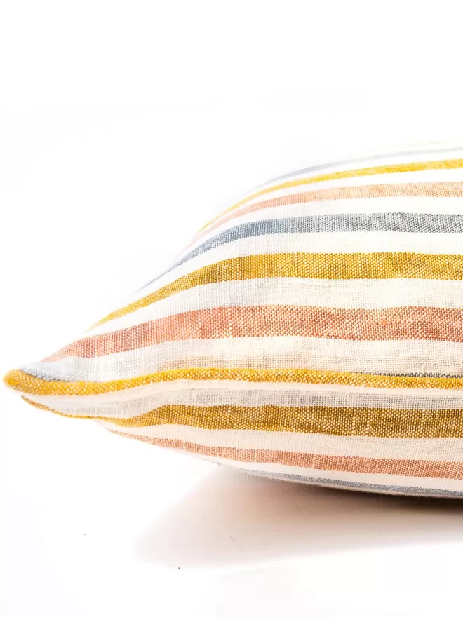 Lumbar cushion in 'Seaside Stripe' corner of cushion