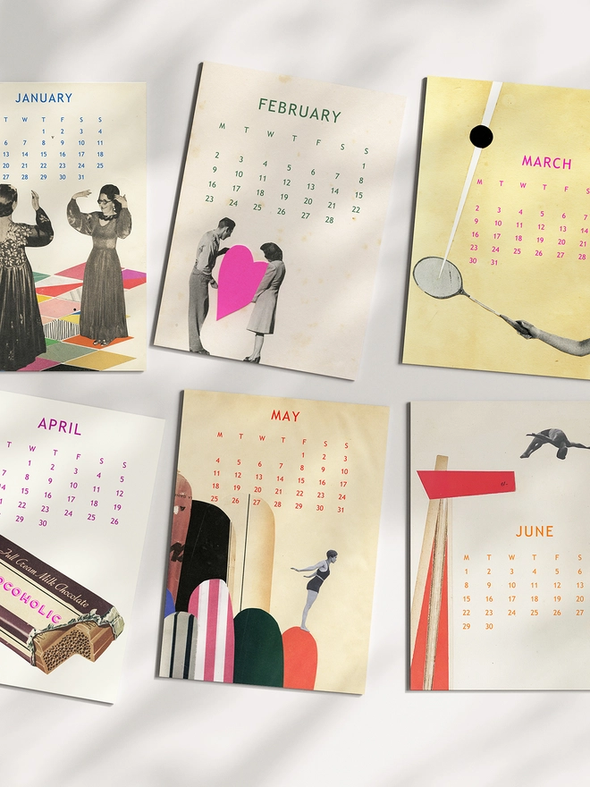Six pages of a desk calendar sitting on a sunlit table.