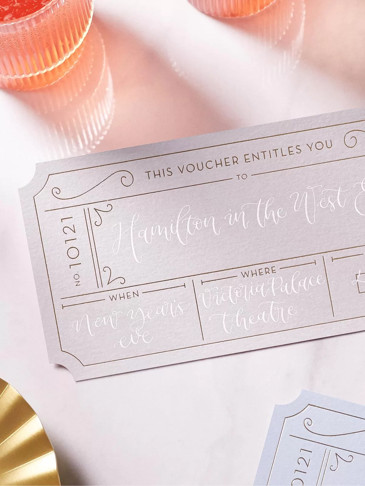 grey and white personalised golden ticket for concert surprise reveal