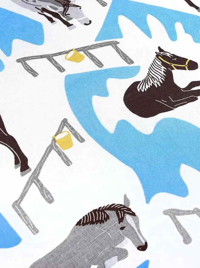 Horse Ranch Duvet Cover And Pillowcase, a blue horse themed set of a duvet cover and pillowcase in a bedroom. 