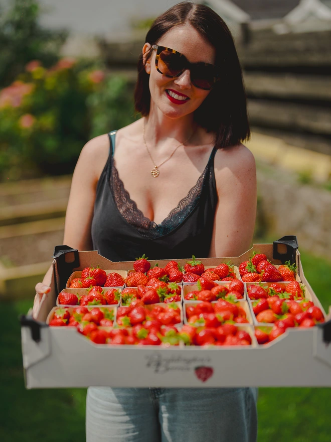 Holly with her strawberries