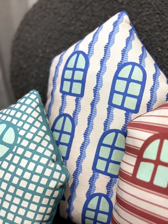 Zoom of set of 3 house cushions
