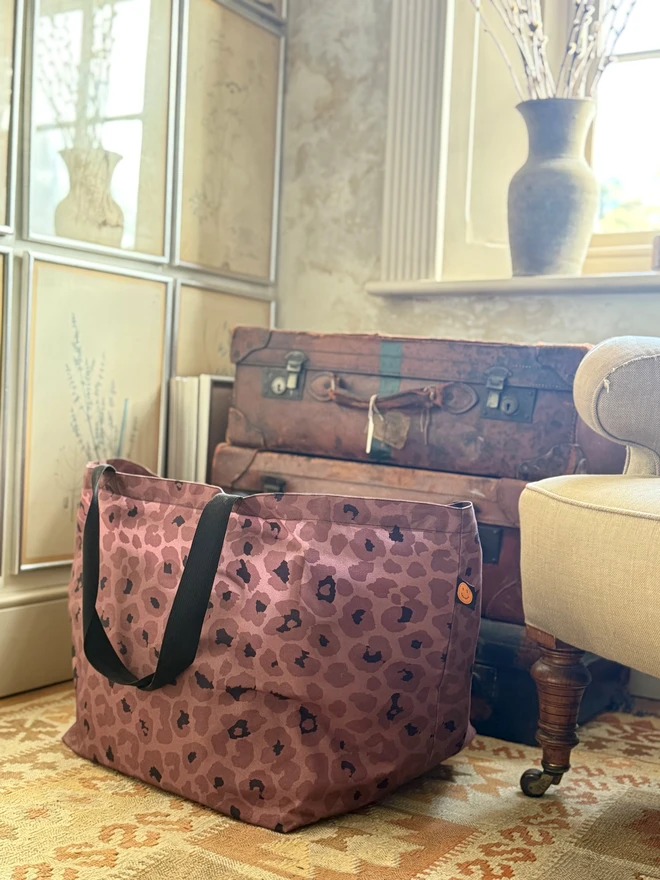 Oversize tote on floor of country house