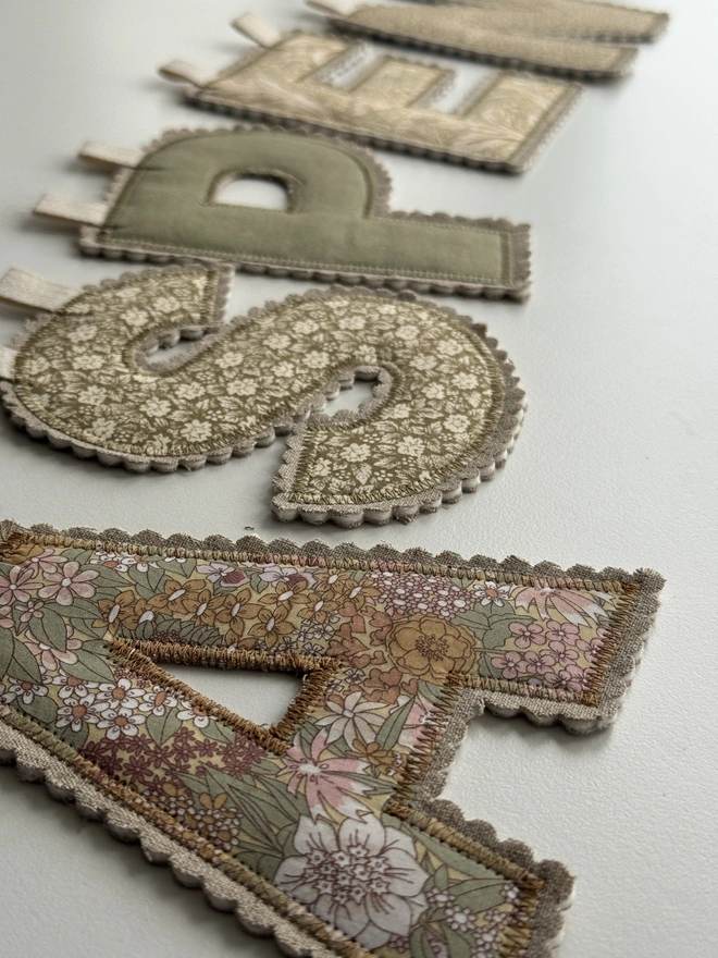 Fabric Letter Garland. A Name Garland spelling ASPEN in floral fabric
