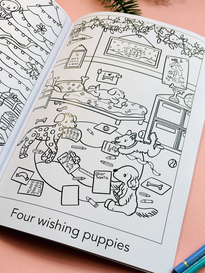 Inside page of children’s Christmas colouring book with hand-drawn animal characters.