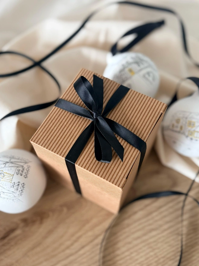 Kraft paper gift box with black satin bow