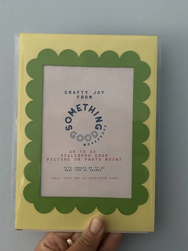 Scallop Edged A5 / A4 photo mount. green and yellow mount photographed against grey background.