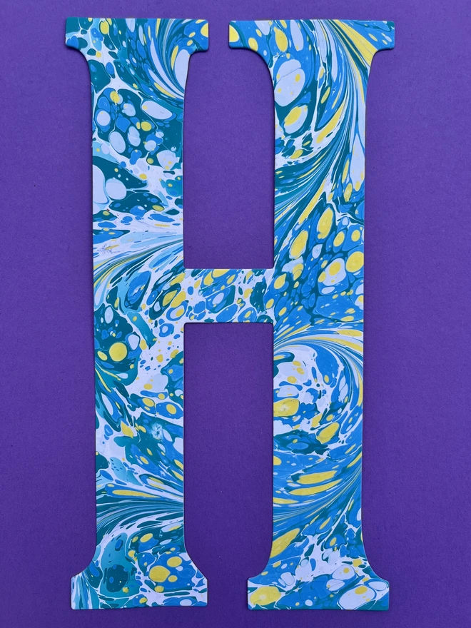 Hand-marbled happy birthday garland letter