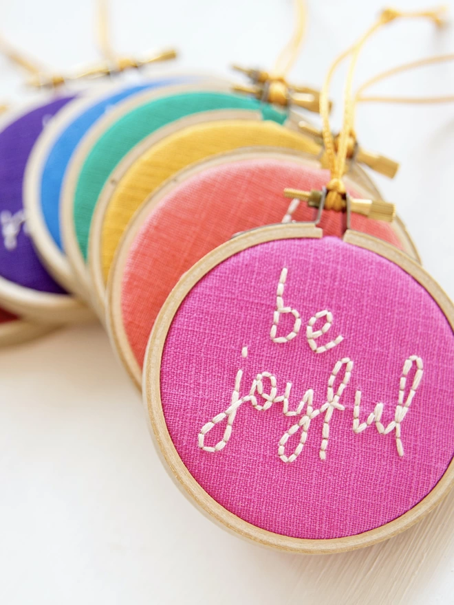 Bright embroidered christmas baubles