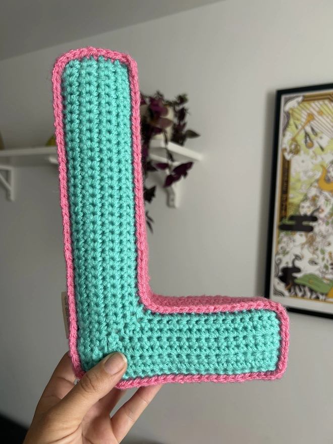 Crochet L cushion in Teal and Pink