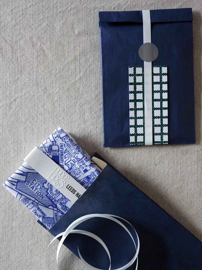 A Mr.PS Leeds Map hankie with optional gift wrapping; navy paper, white ribbon and patterned gift card