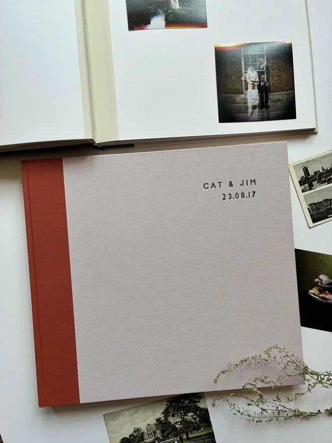 two handmade photograph albums, one open and one closed. Handmade by Keep Collect