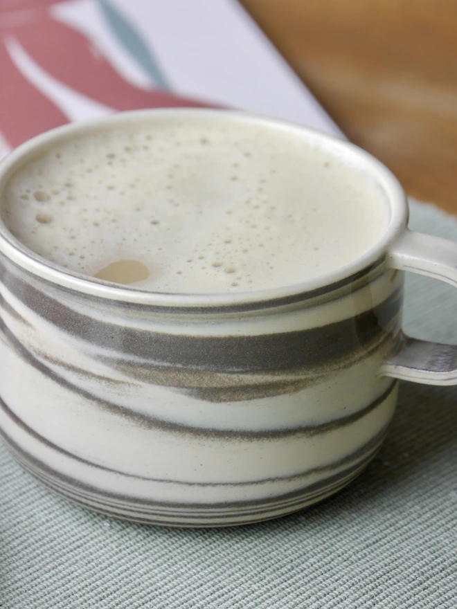 Small handmade grey and white marble mug