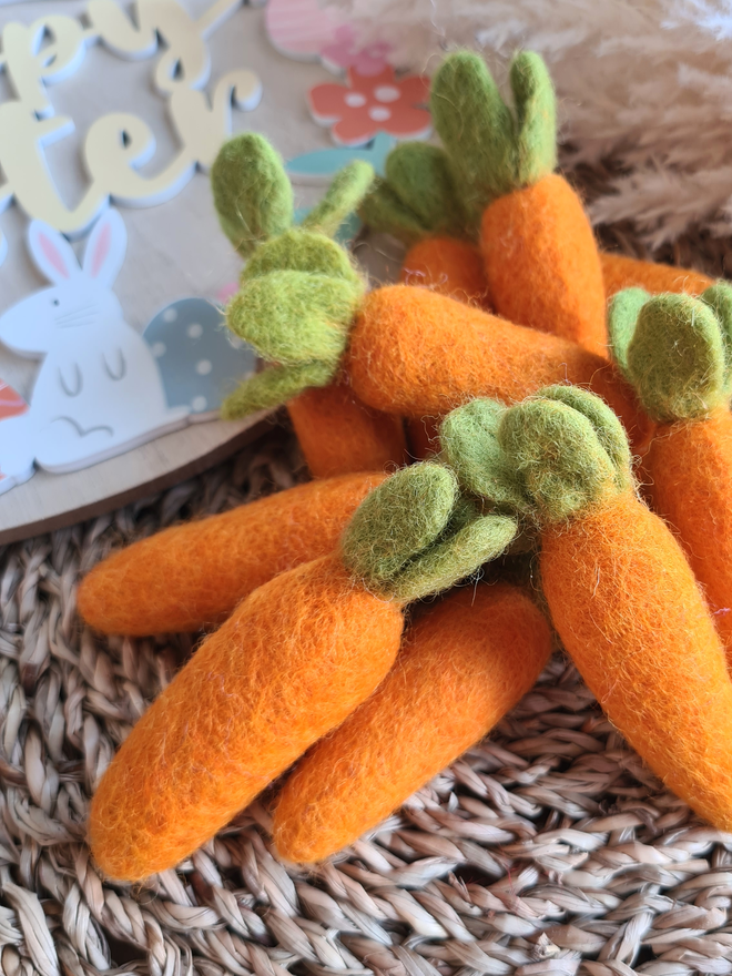 Bunch of orange felt wool carrots